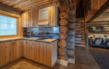 Фото номера Деревянный коттедж Отель Wilderness Hotel Nellim &amp; Igloos г. Неллимо 4